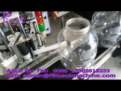 Büyük yuvarlak şişeler için otomatik yapışkan etiketleme makinesi